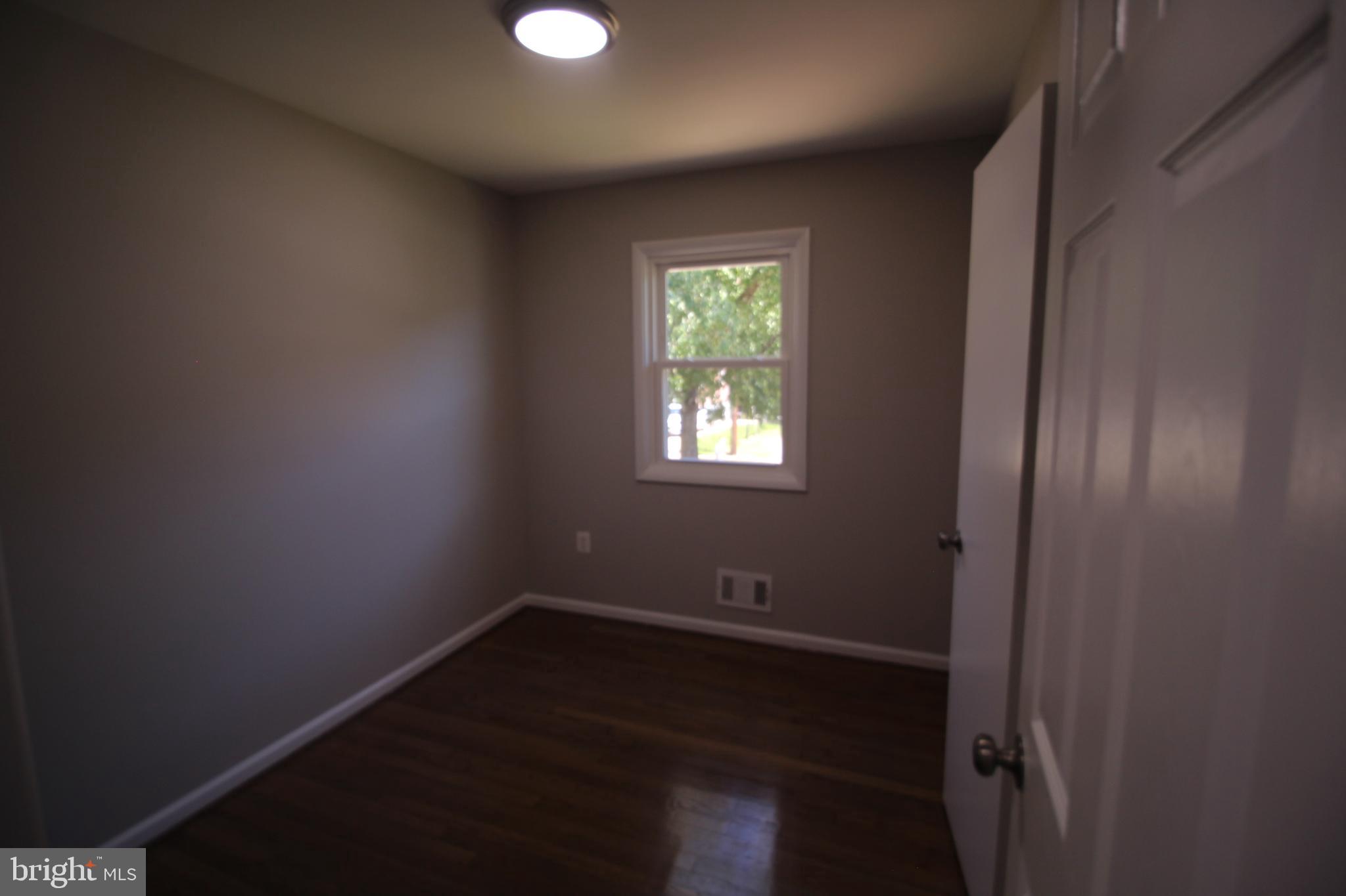 9003 Anna Drive Clinton, MD 20735 - Photo 18 of 41 an empty room with windows