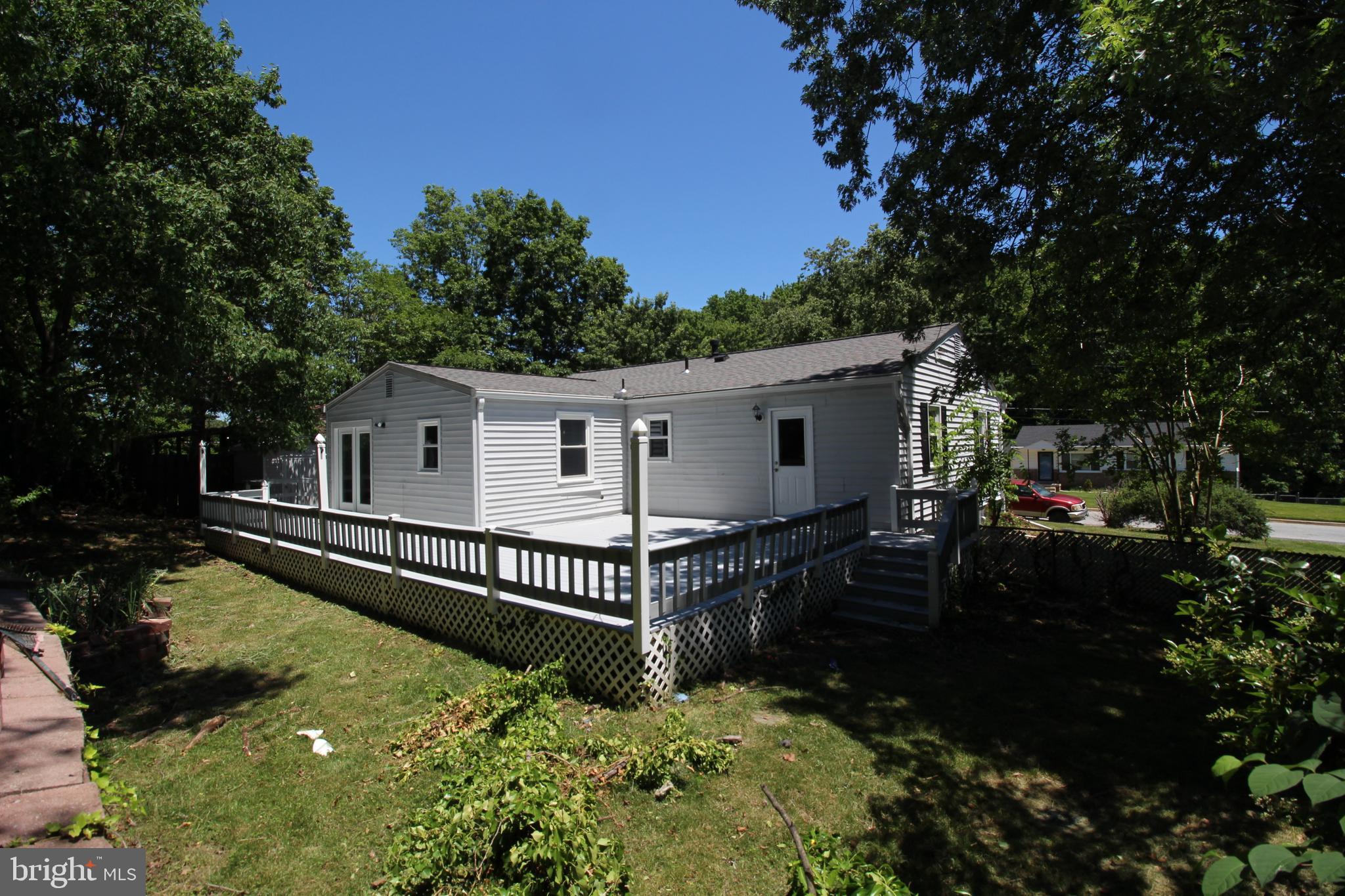 9003 Anna Drive Clinton, MD 20735 - Photo 5 of 41 a view of a house with backyard and sitting area
