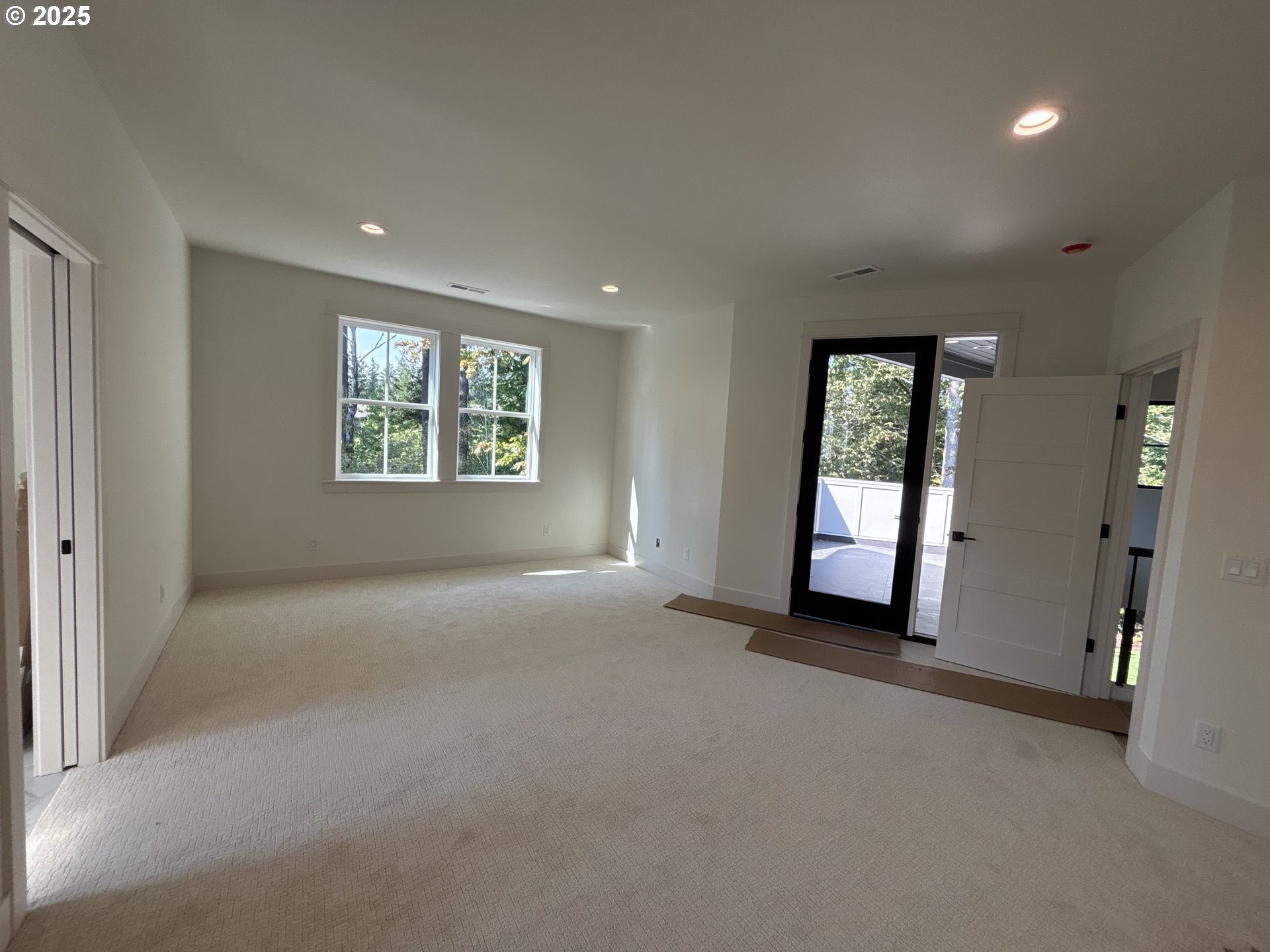 9999 Southwest Taylor Street Portland, OR 97225 - Photo 18 of 32 an empty room with windows and closet