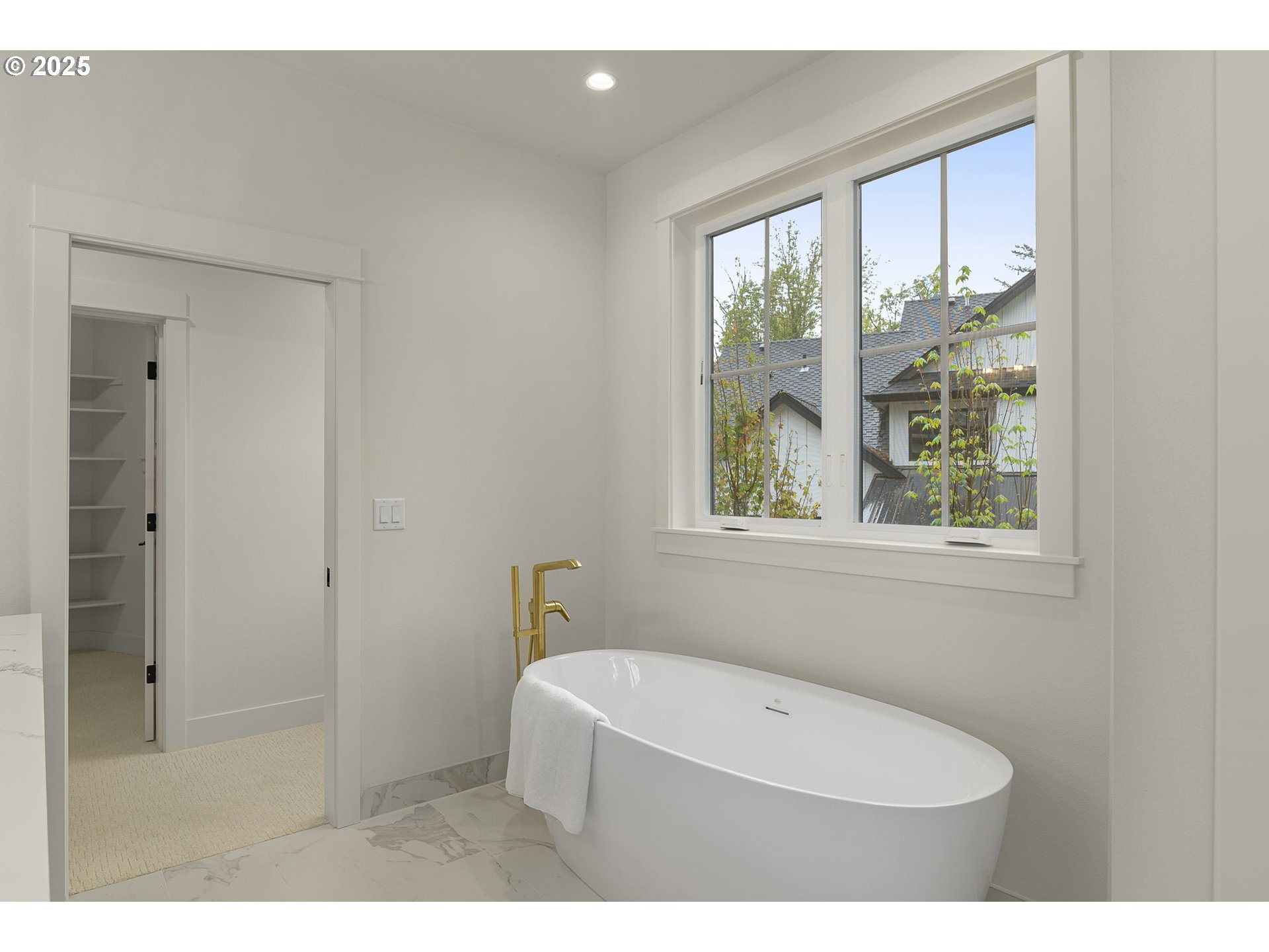 9999 Southwest Taylor Street Portland, OR 97225 - Photo 25 of 32 a bathroom with a toilet a sink and a window