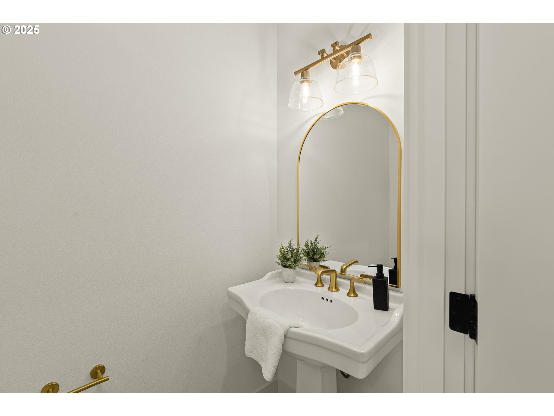 9999 Southwest Taylor Street Portland, OR 97225 - Photo 28 of 32 a bathroom with a sink and a mirror