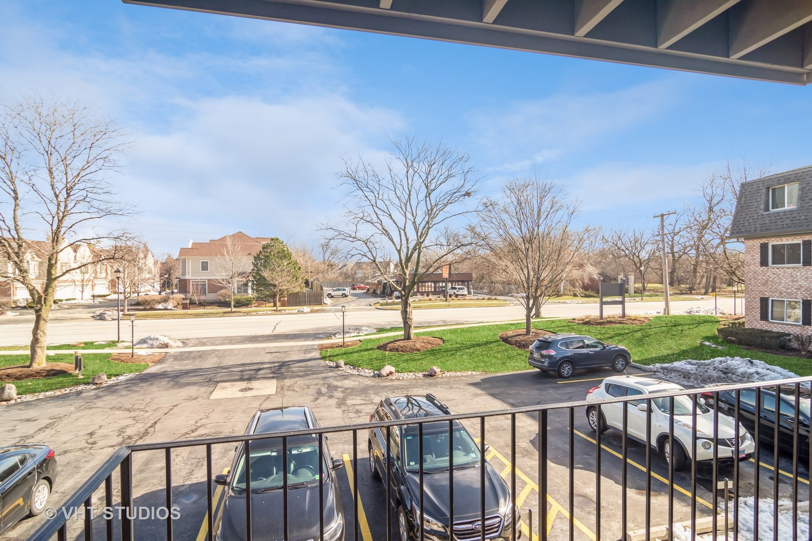 904 South Plum Grove Road, Unit 202 Palatine, IL 60067 - Photo 12 of 14 a view of a patio with chairs and a yard