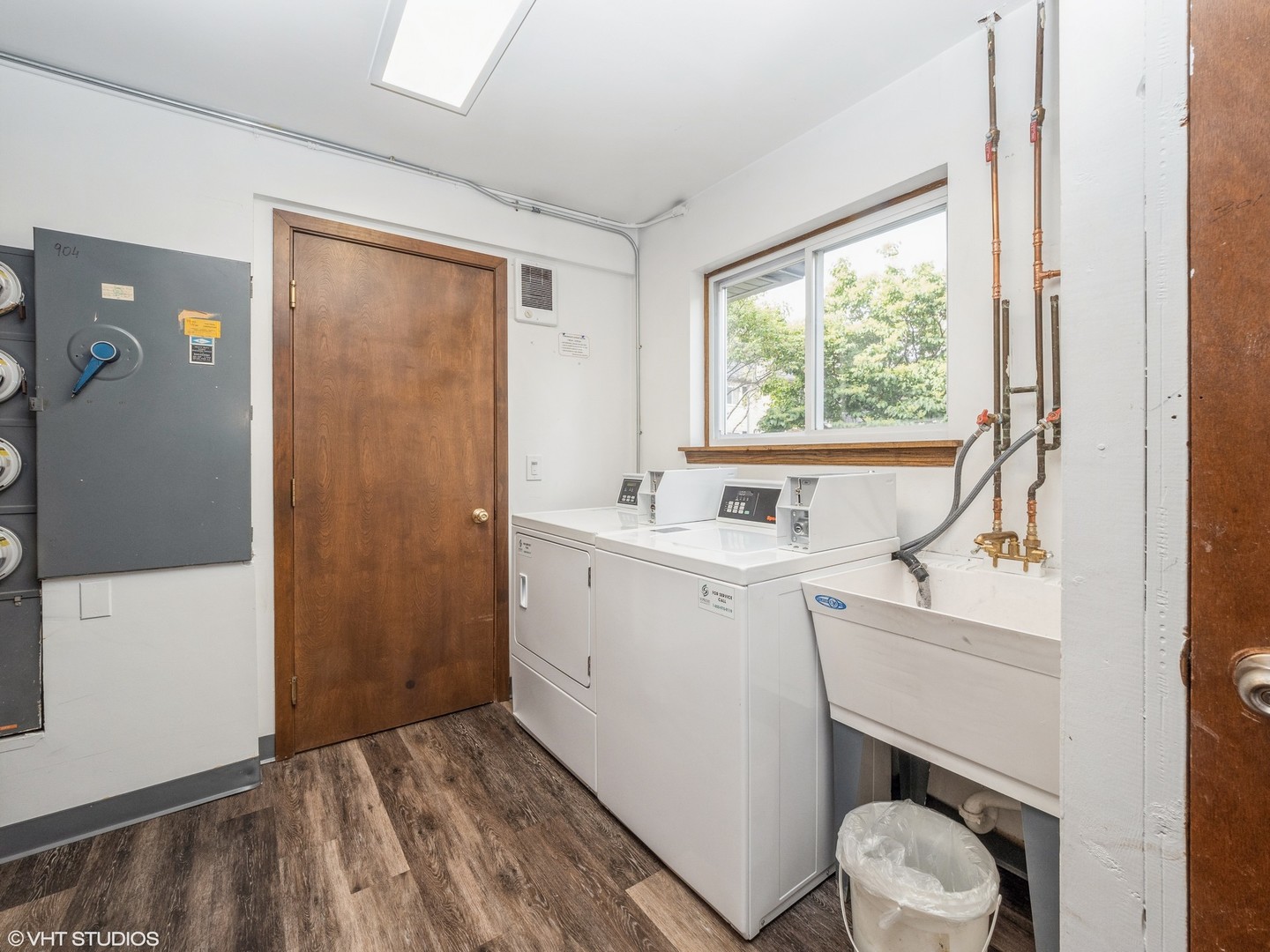 904 South Plum Grove Road, Unit 202 Palatine, IL 60067 - Photo 13 of 14 a bathroom with a sink toilet and window