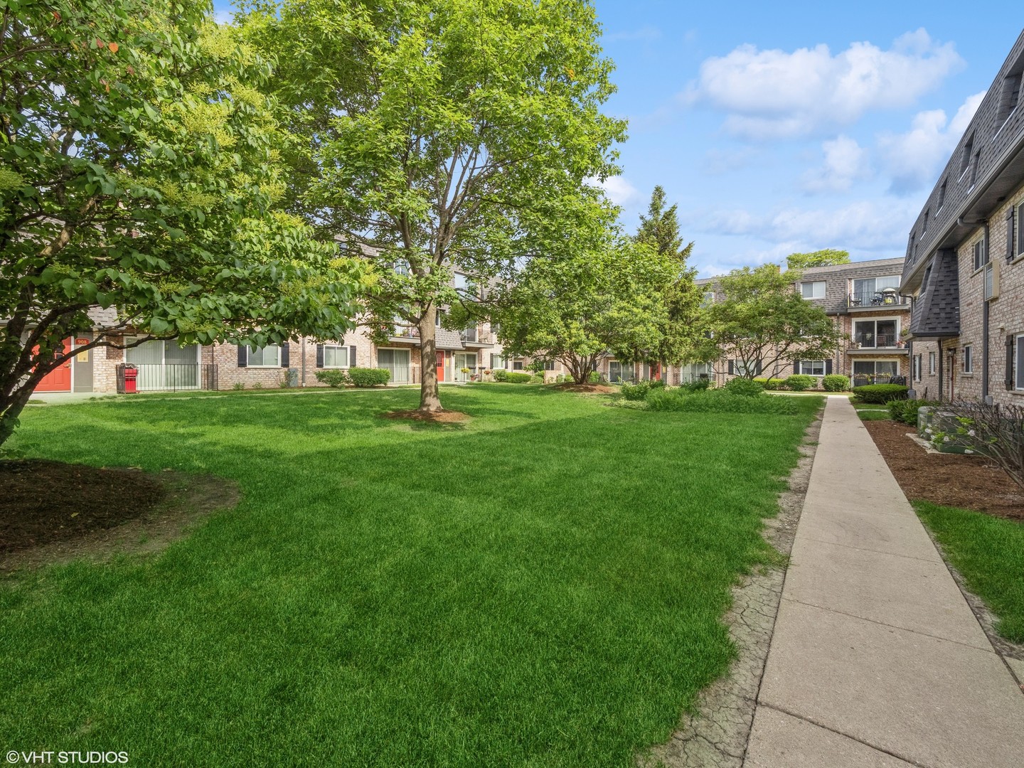 904 South Plum Grove Road, Unit 202 Palatine, IL 60067 - Photo 14 of 14 a view of a park with large trees
