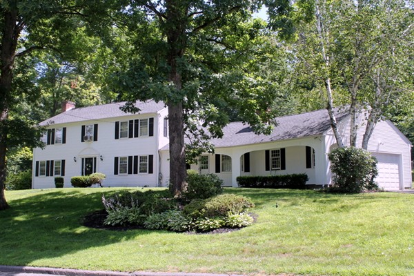 23 West Colonial Road Wilbraham, MA 01095 - Photo 1 of 30 a front view of a house with a yard