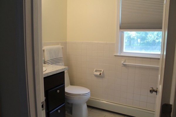 23 West Colonial Road Wilbraham, MA 01095 - Photo 13 of 30 a bathroom with a toilet and a sink