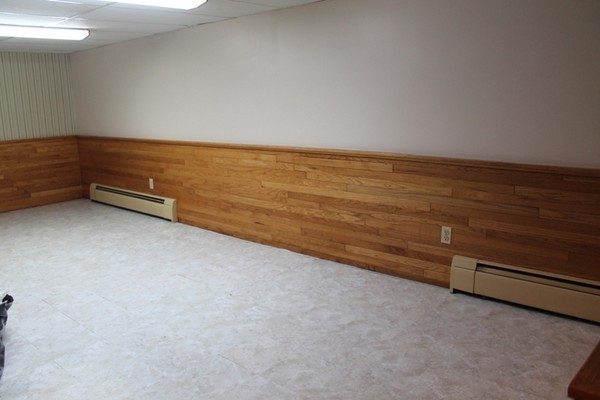 23 West Colonial Road Wilbraham, MA 01095 - Photo 23 of 30 a view of an empty room with a ceiling fan and window