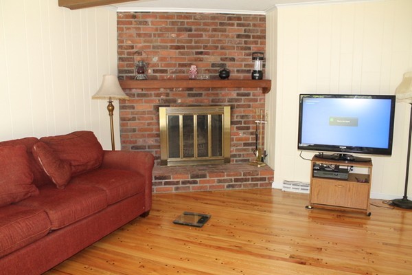 23 West Colonial Road Wilbraham, MA 01095 - Photo 7 of 30 a living room with furniture and a flat screen tv