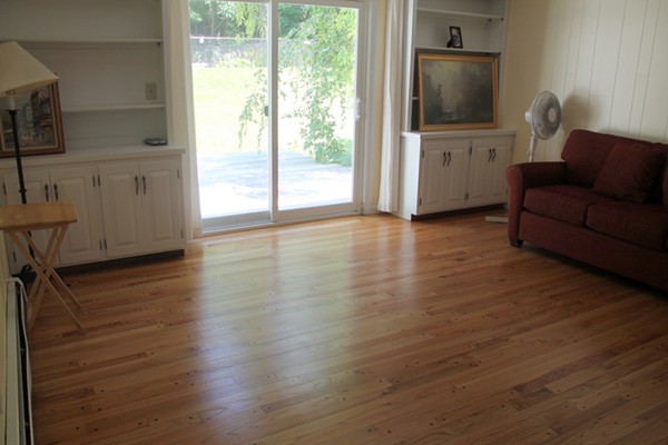 23 West Colonial Road Wilbraham, MA 01095 - Photo 8 of 30 a living room with furniture and a flat screen tv