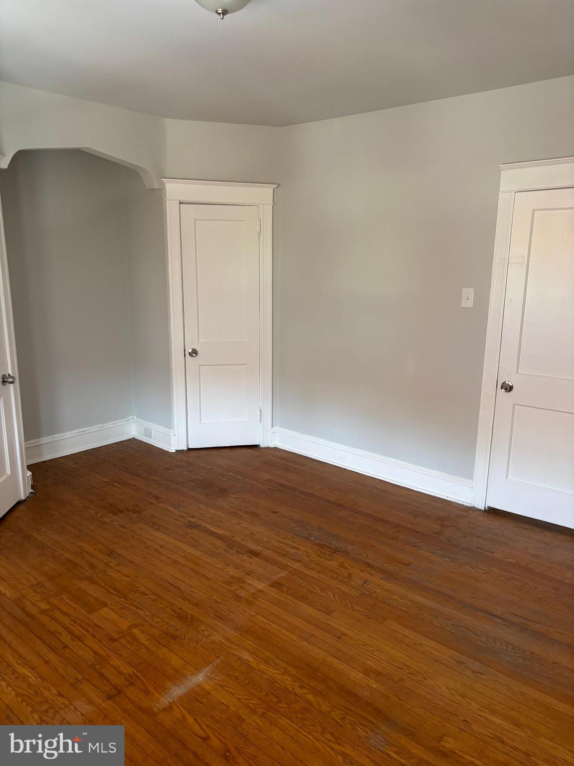 227 Wembly Road Upper Darby, PA 19082 - Photo 18 of 19 a view of empty room with wooden floor