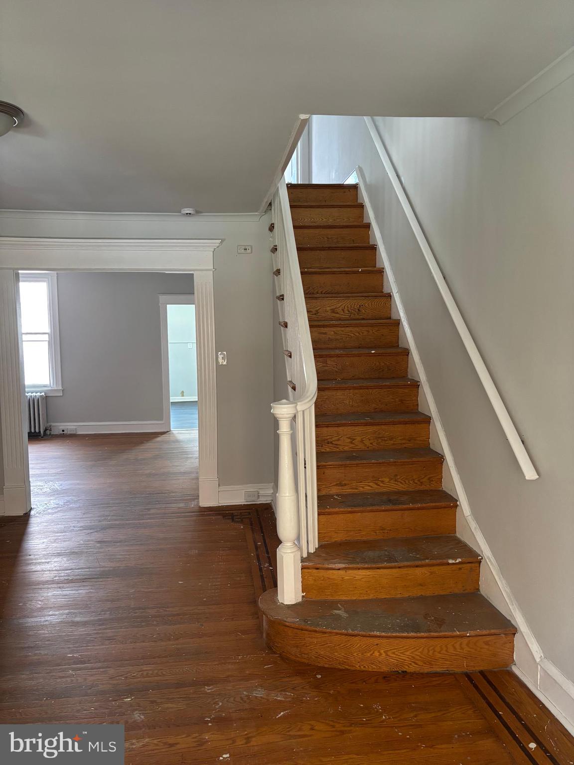 227 Wembly Road Upper Darby, PA 19082 - Photo 5 of 19 a view of entryway and hall with wooden floor