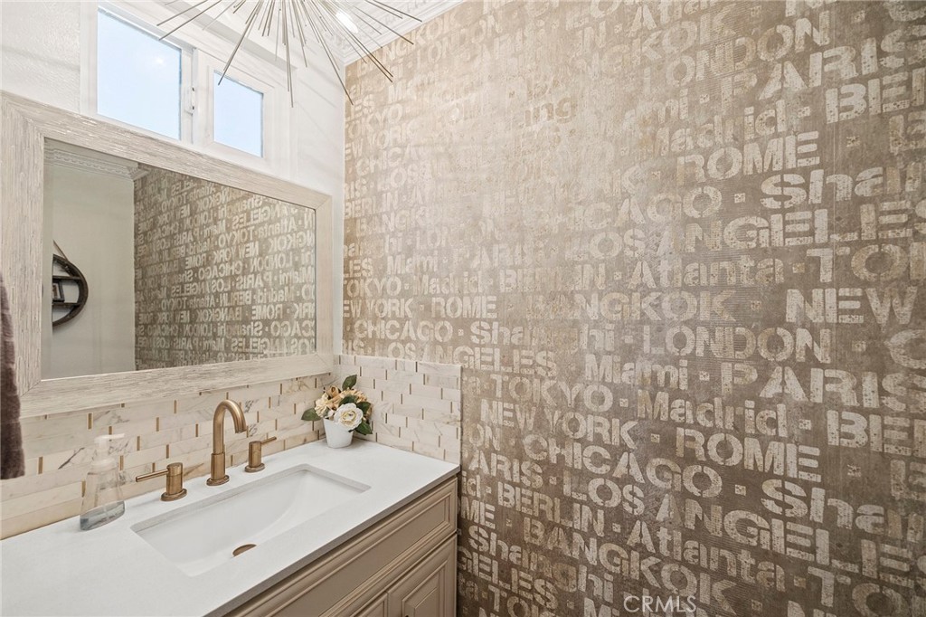 41480 Luz Del Sol Temecula, CA 92591 - Photo 13 of 44 a bathroom with a sink and a mirror