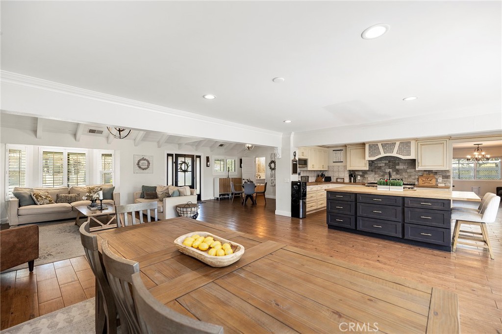 41480 Luz Del Sol Temecula, CA 92591 - Photo 16 of 44 a large kitchen with a table and chairs
