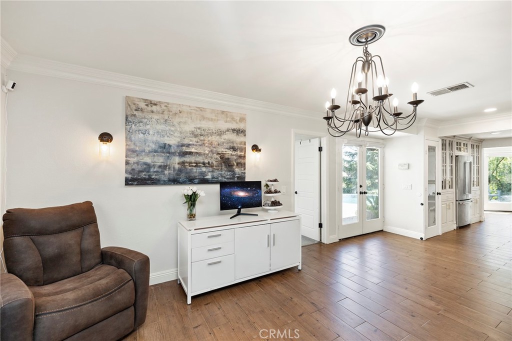 41480 Luz Del Sol Temecula, CA 92591 - Photo 23 of 44 a living room with furniture and a chandelier