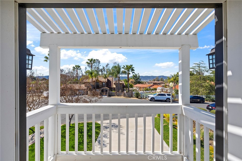 41480 Luz Del Sol Temecula, CA 92591 - Photo 30 of 44 a view of a glass door and deck