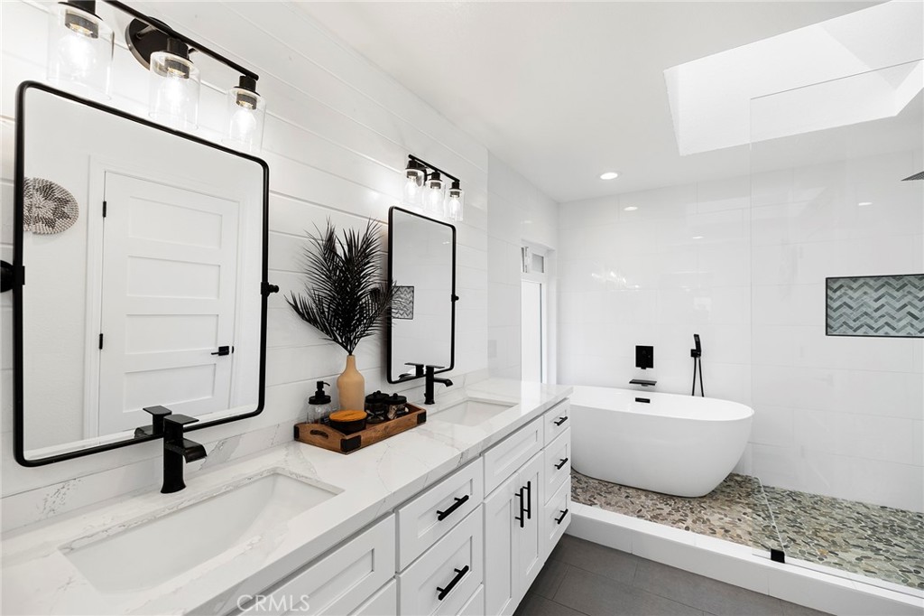 41480 Luz Del Sol Temecula, CA 92591 - Photo 31 of 44 a bathroom with a sink double vanity