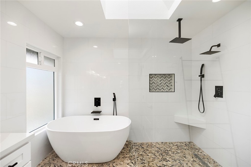 41480 Luz Del Sol Temecula, CA 92591 - Photo 32 of 44 a bathroom with a sink a toilet and shower
