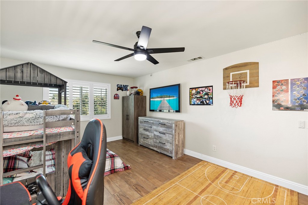 41480 Luz Del Sol Temecula, CA 92591 - Photo 34 of 44 a bedroom with furniture and a window