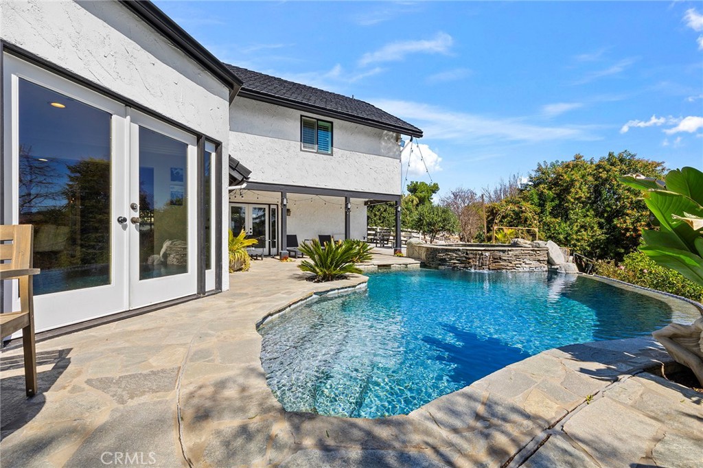 41480 Luz Del Sol Temecula, CA 92591 - Photo 37 of 44 a view of a backyard with swimming pool