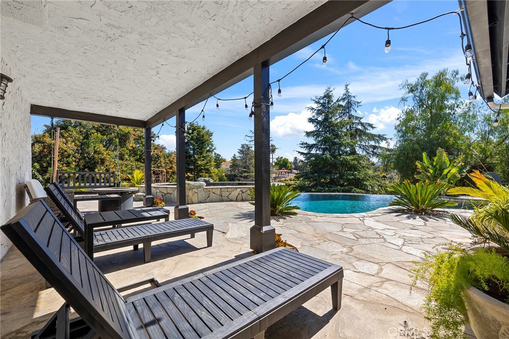 41480 Luz Del Sol Temecula, CA 92591 - Photo 38 of 44 a view of a patio with lawn chairs next to a yard