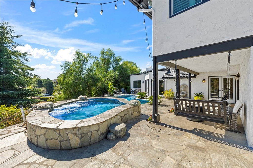 41480 Luz Del Sol Temecula, CA 92591 - Photo 39 of 44 a view of a house with backyard and sitting area
