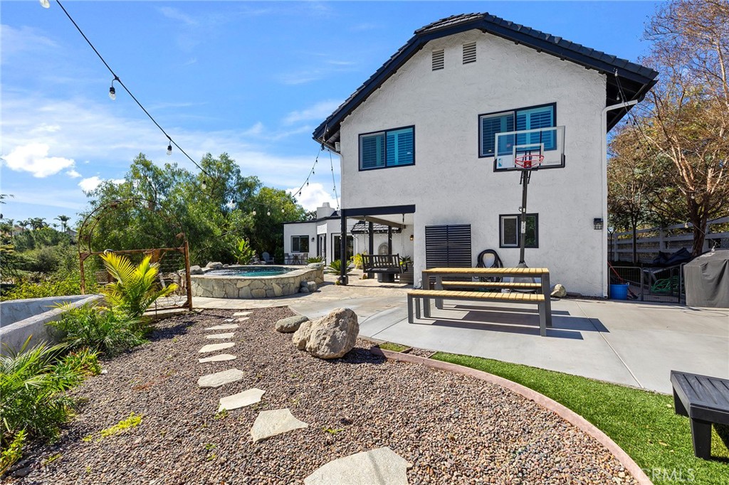 41480 Luz Del Sol Temecula, CA 92591 - Photo 40 of 44 a view of a house with backyard and sitting area