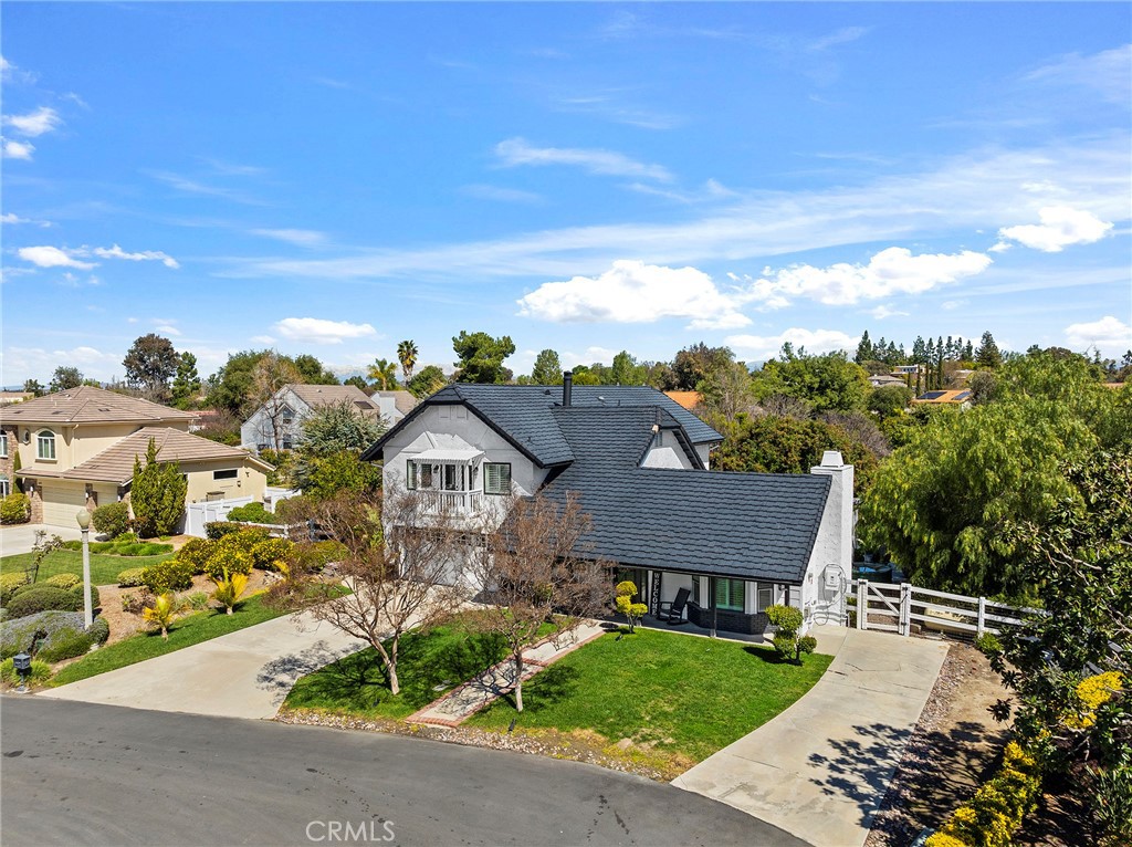 41480 Luz Del Sol Temecula, CA 92591 - Photo 44 of 44 a view of a house with a yard and potted plants