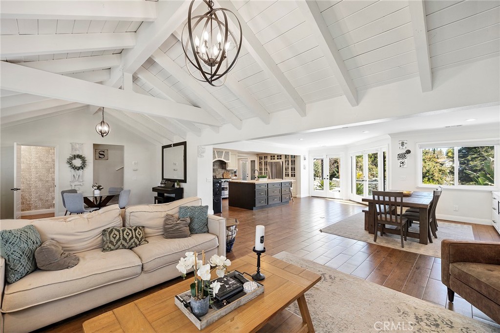 41480 Luz Del Sol Temecula, CA 92591 - Photo 10 of 44 a living room with furniture a dining table and a large window