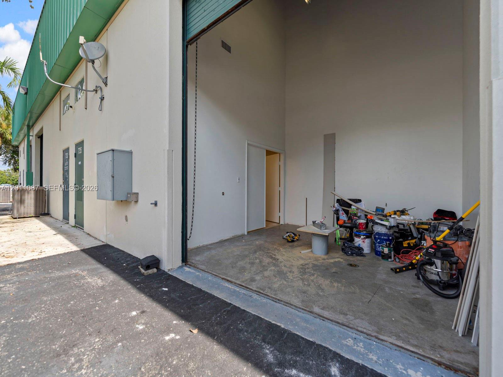 735 Shotgun Road Sunrise, FL 33326 - Photo 20 of 21 a view of a garage