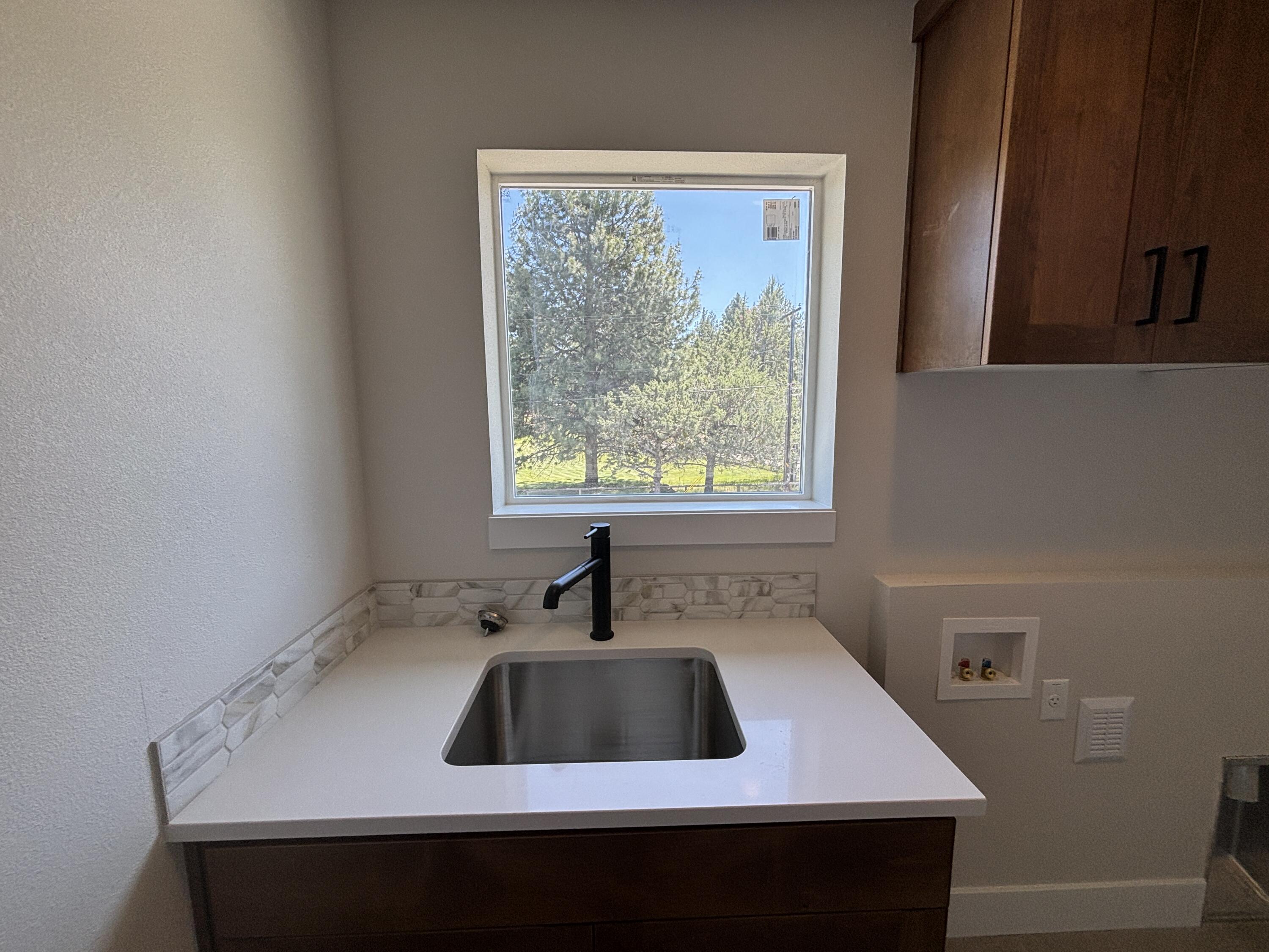 63337 O. B. Riley Road, Unit LOT 15 Bend, OR 97703 - Photo 13 of 27 Laundry Room