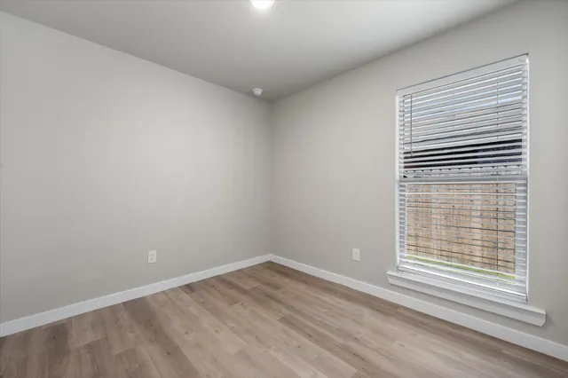 a view of a room that has a window in it