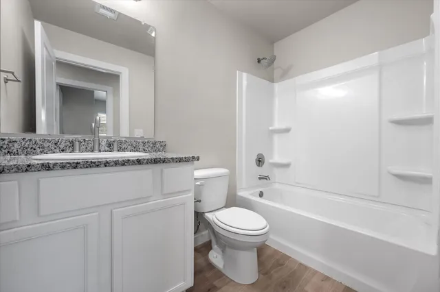 a view of a backyard with a garden