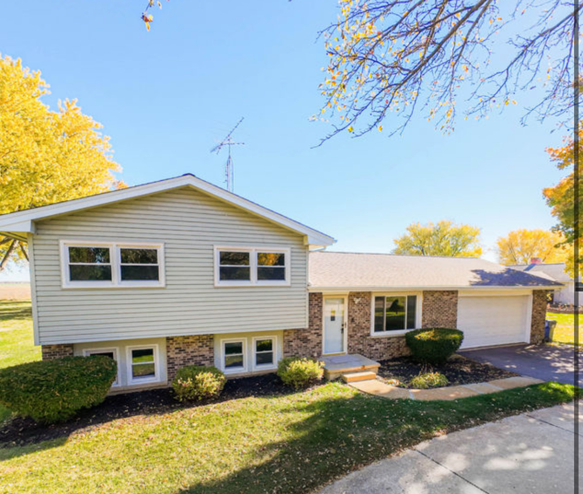 21044 Virginia Road DeKalb, IL 60115 - Photo 1 of 58 a view of a yard in front of a house