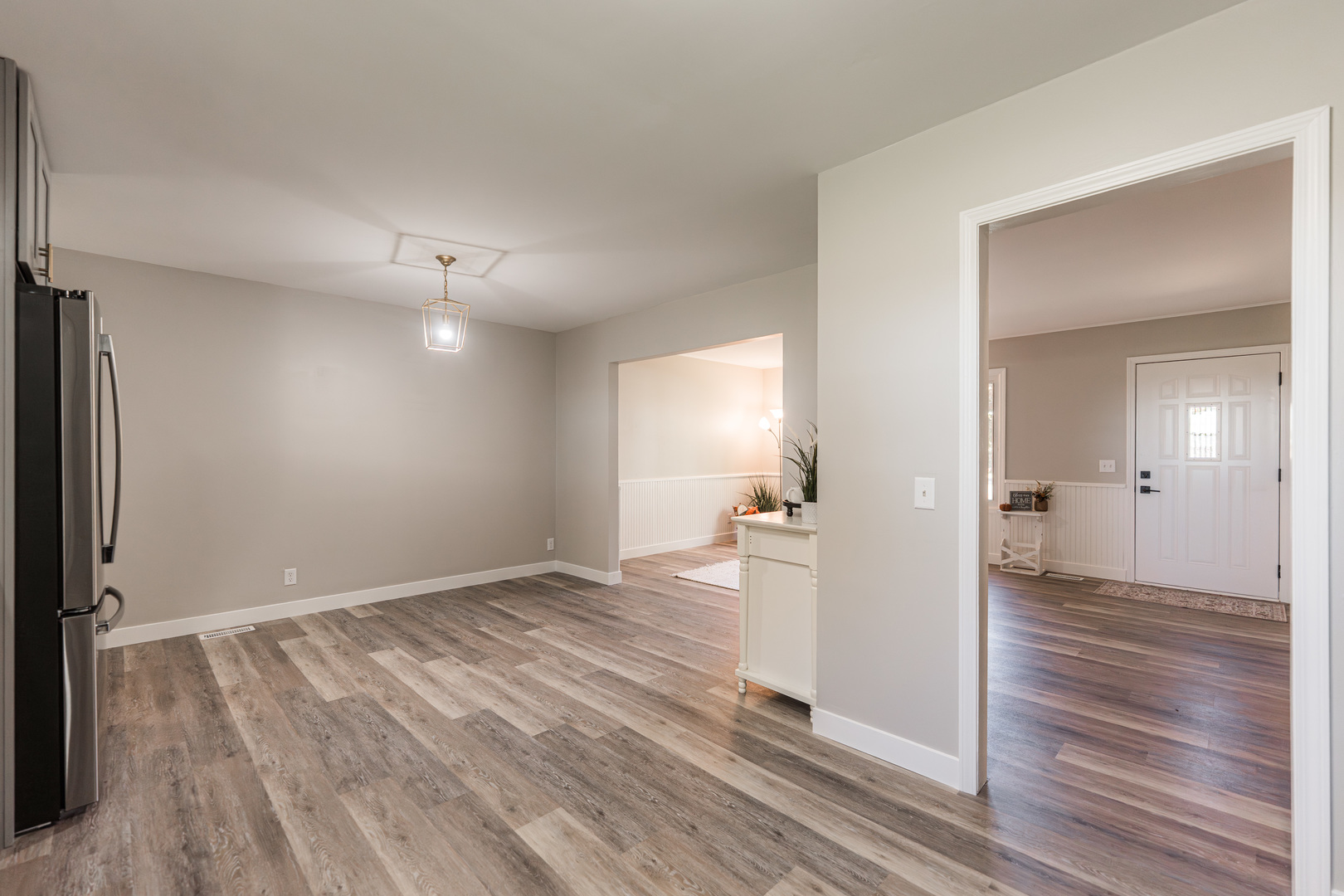 21044 Virginia Road DeKalb, IL 60115 - Photo 22 of 58 wooden floor in an empty room with a mirror