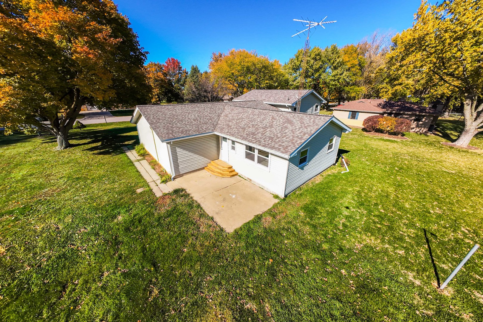 21044 Virginia Road DeKalb, IL 60115 - Photo 51 of 58 a view of a house with a yard and sitting area