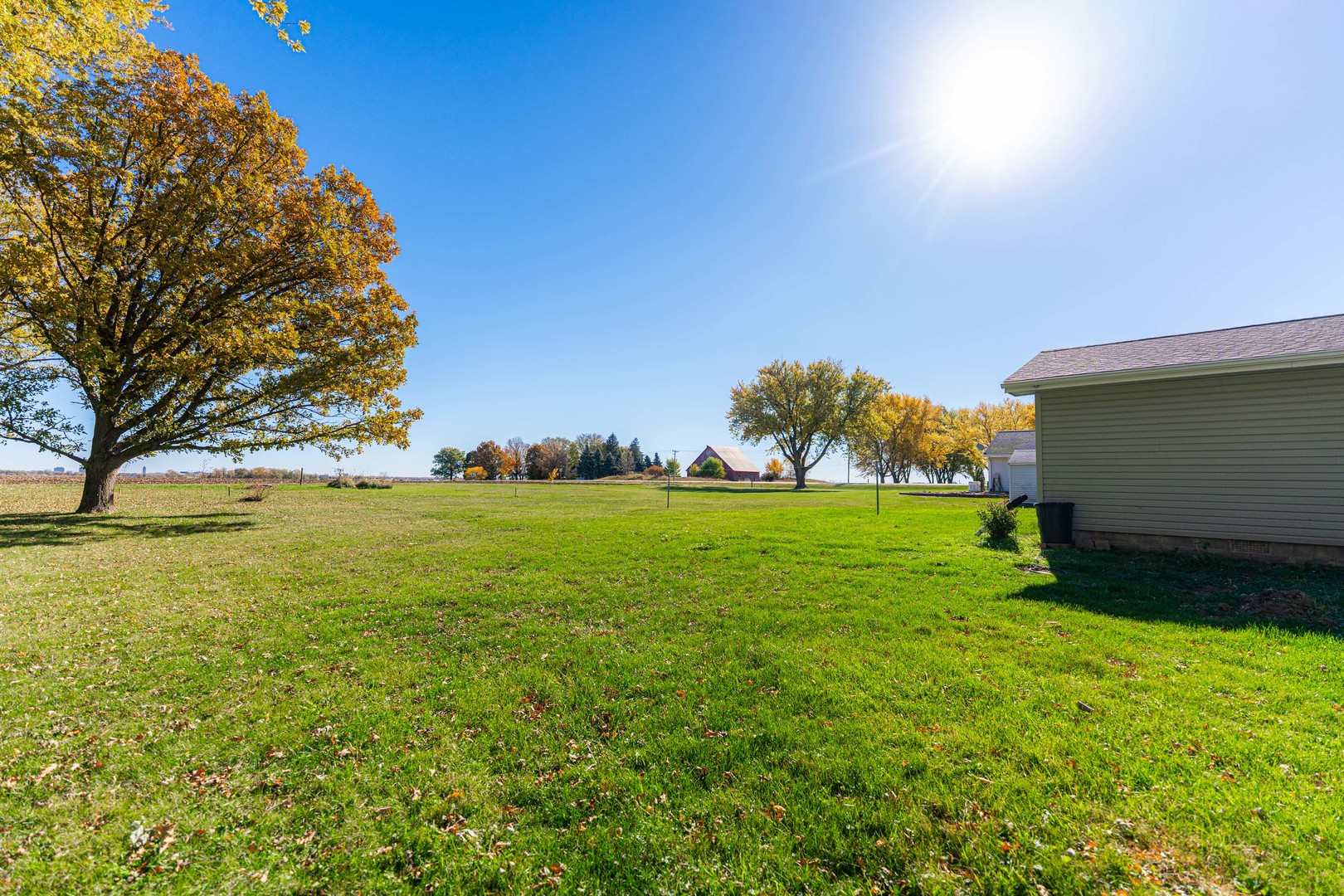 21044 Virginia Road DeKalb, IL 60115 - Photo 53 of 58 a view of an outdoor space and a yard