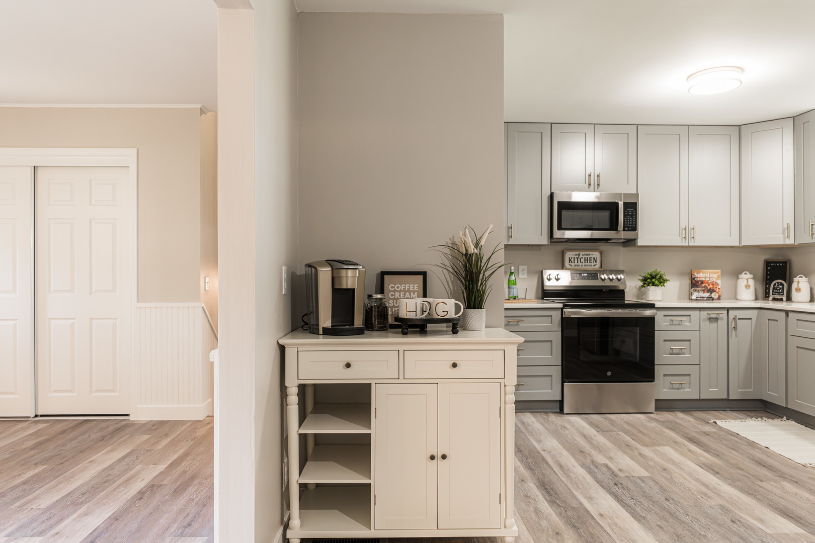 21044 Virginia Road DeKalb, IL 60115 - Photo 10 of 58 a kitchen with a stove and a refrigerator
