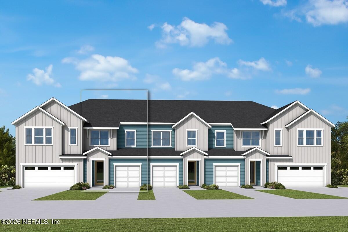 804 Bluestem Street Yulee, FL 32097 - Photo 1 of 3 a front view of residential houses with yard