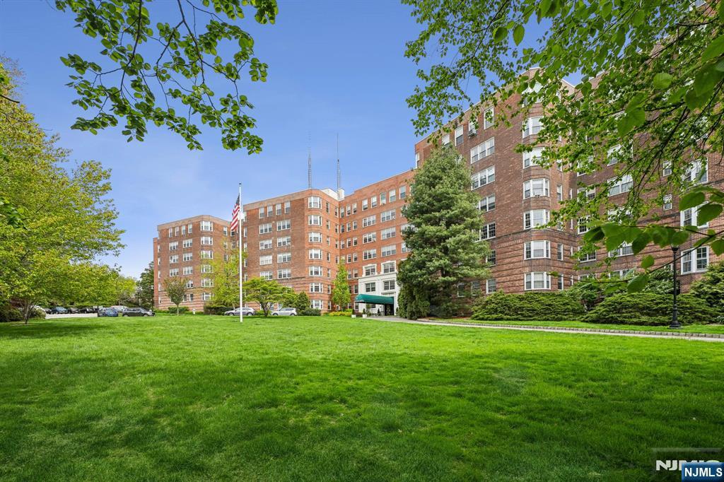 10 Crestmont Road, Unit 5J Montclair, NJ 07042 - Photo 20 of 21 a view of a building with a yard