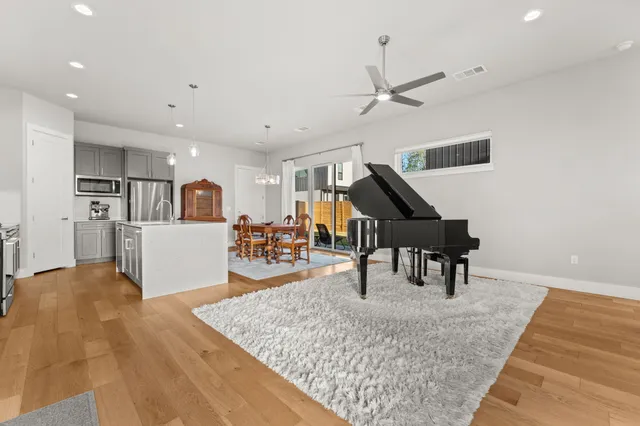 a living room with furniture and a table