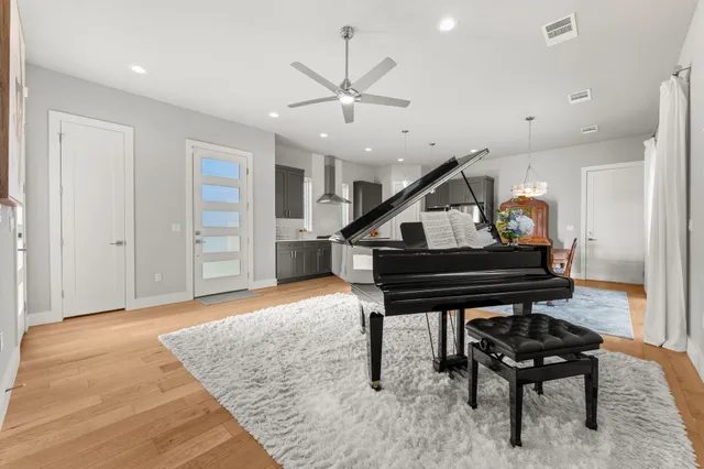 a room with furniture and wooden floor