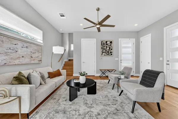 a living room with furniture and a window