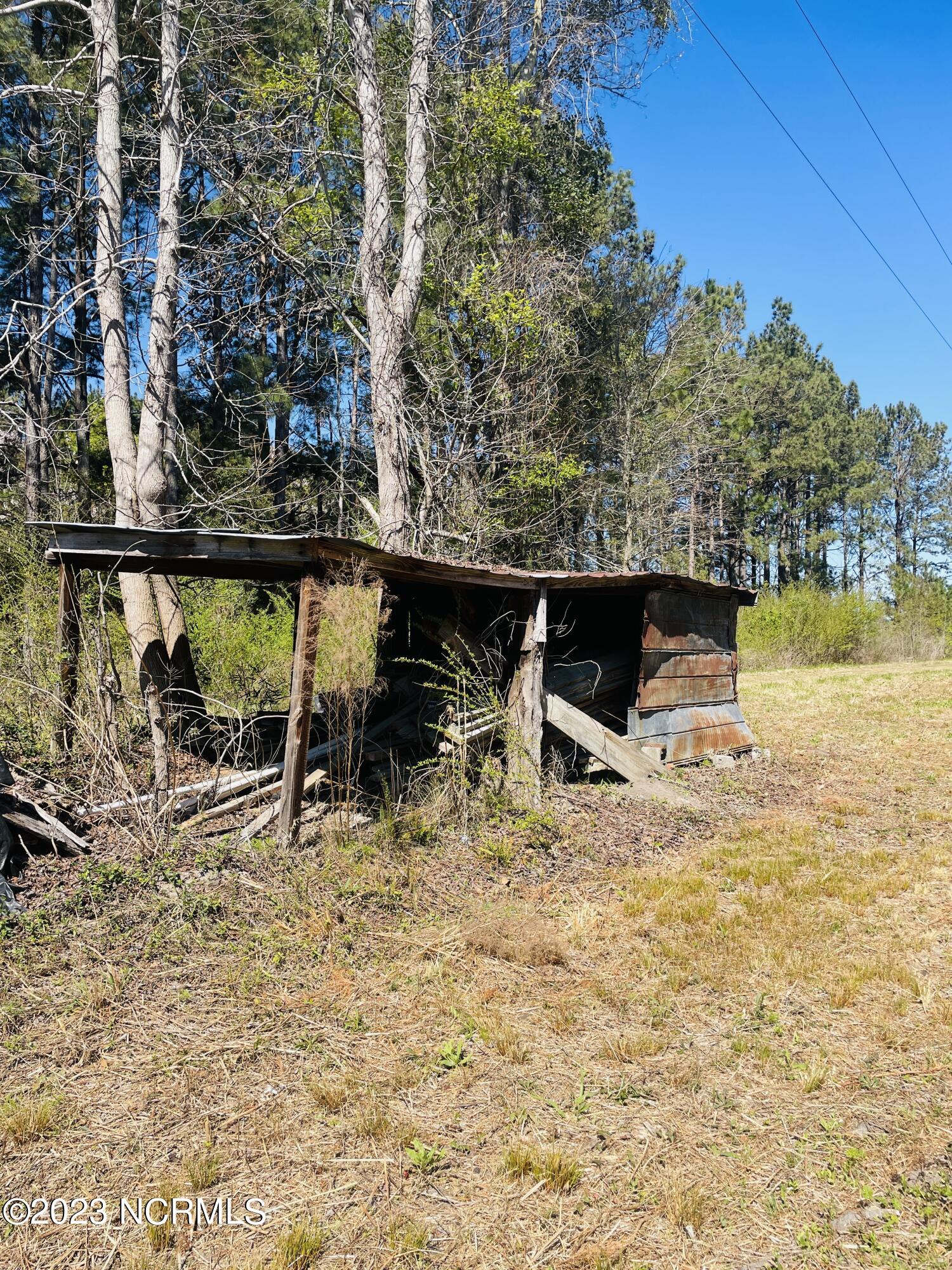 6185 Rough And Ready Road Chadbourn, NC 28431 - Photo 21 of 78 First building from roadway located to left side of the driveway.