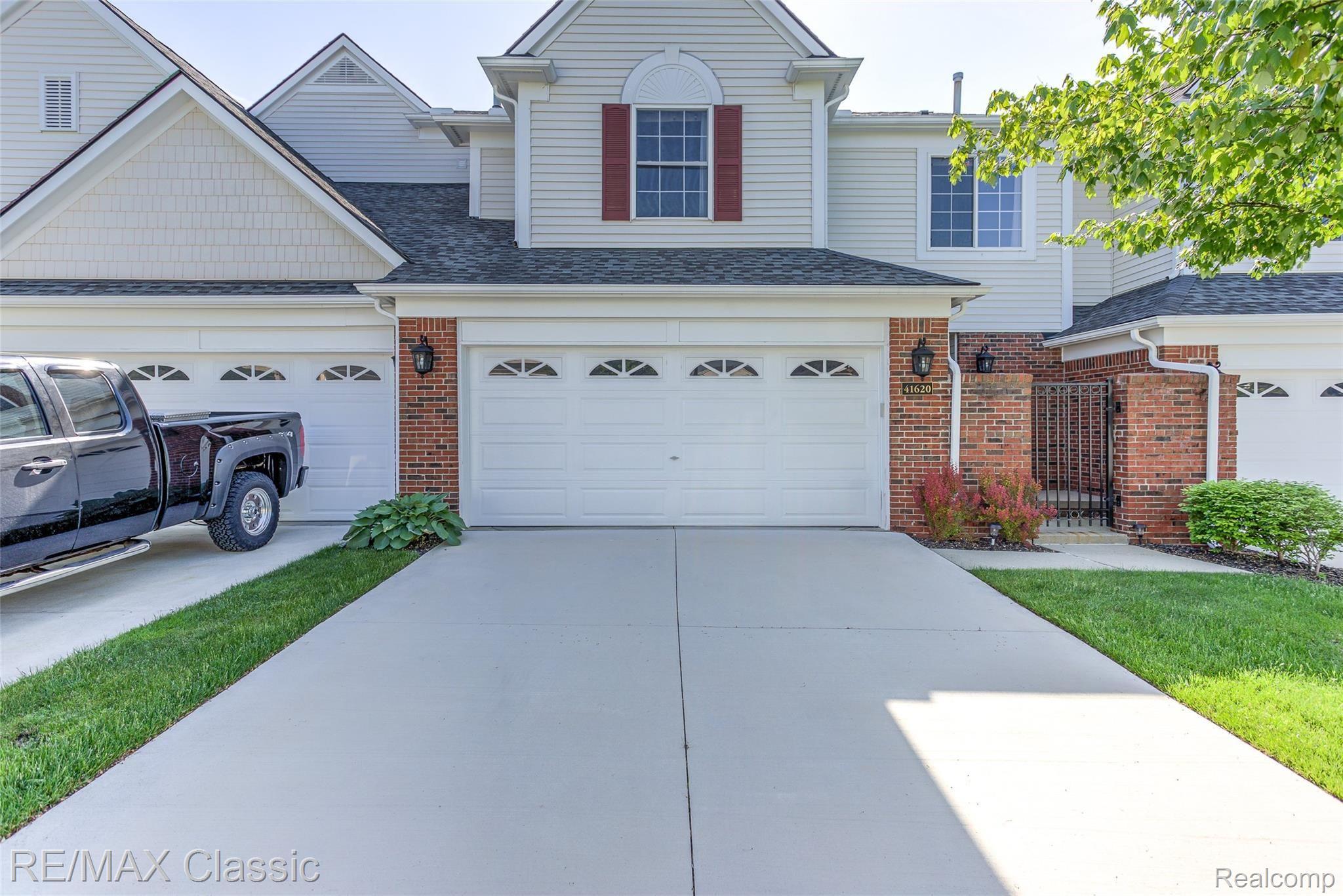 41620 Mitchell Road Novi, MI 48377 - Photo 7 of 40 2 car attached garage with direct unit access