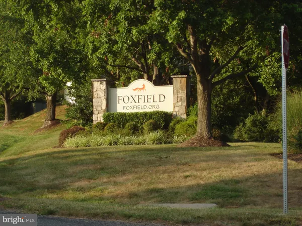 a view of street with sign board