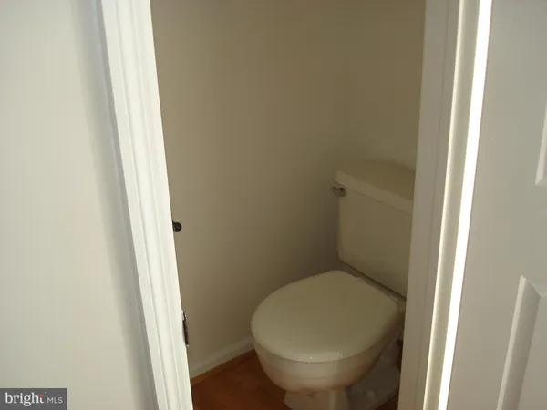 a bathroom with a toilet and a sink