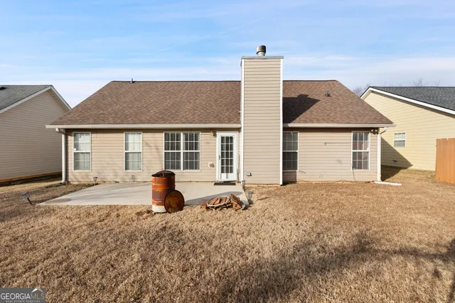 a house view with a garden space