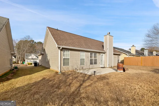 a front view of a house with a outdoor space