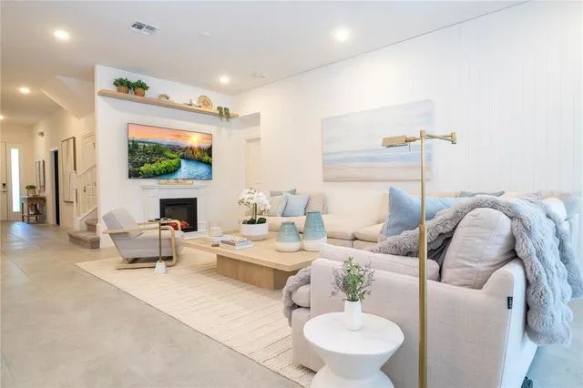 a bathroom with a shower sink and mirror