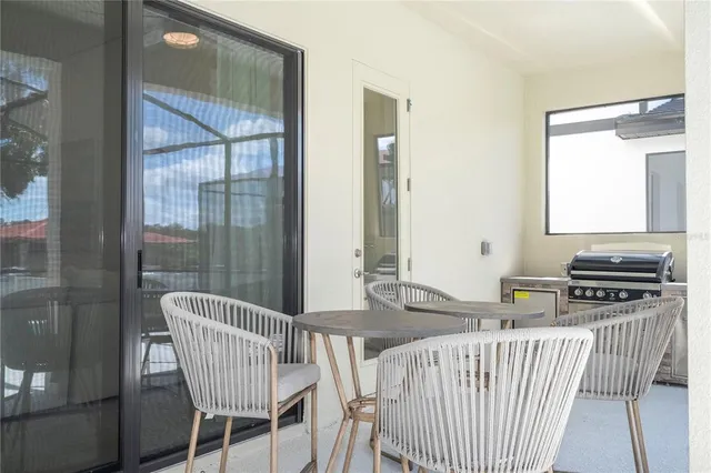 a bedroom with a bed and a table in it